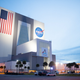 The SLS rocket (far right) arriving at the Vehicle Assembly Building on the morning of Tuesday, September 27.